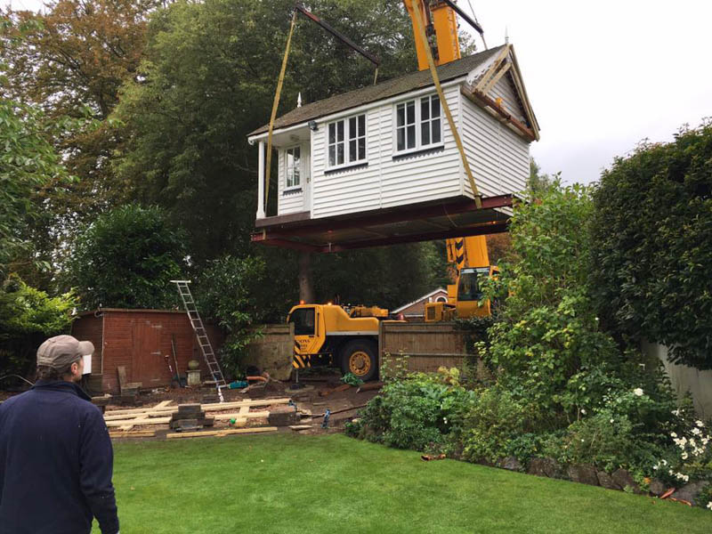 Garden office installed by a crane