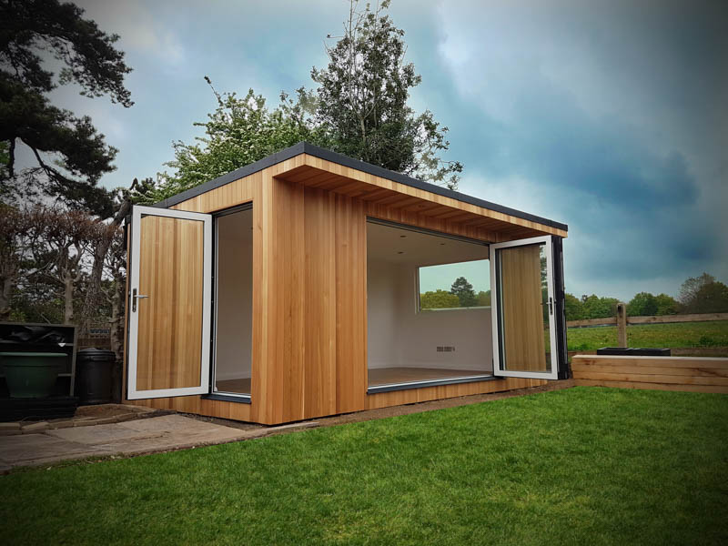 Doors on two sides allow for easy access into the garden office