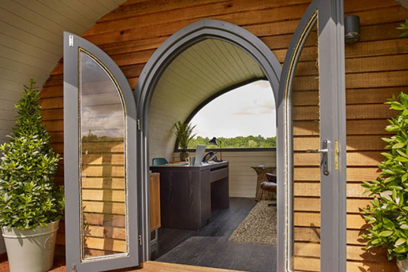 The pod has arched doors